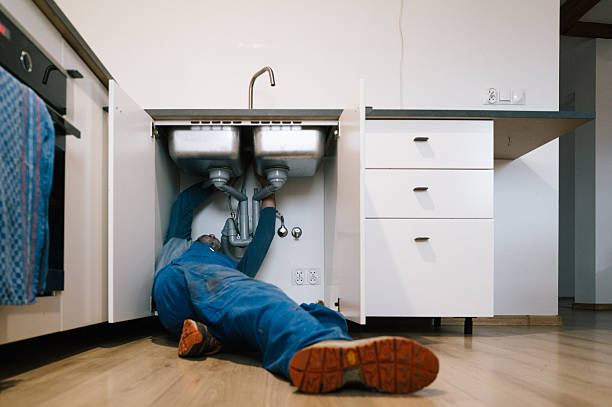 Professional Drain Cleaning technician working in Proctor, AR